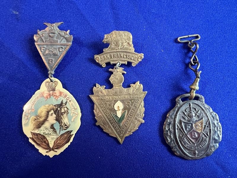 THREE KNIGHTS OF PYTHIAS FRATERNAL BADGES AND WATCH FOB COLLECTION