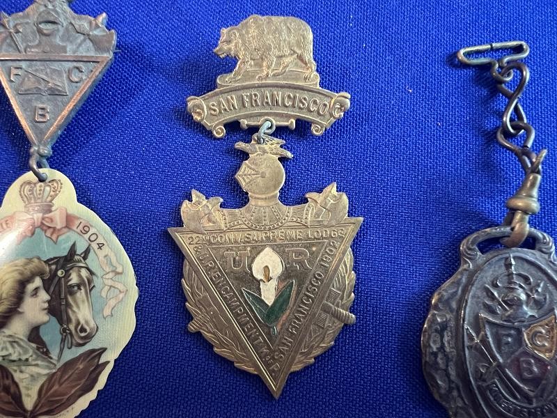 THREE KNIGHTS OF PYTHIAS FRATERNAL BADGES AND WATCH FOB COLLECTION