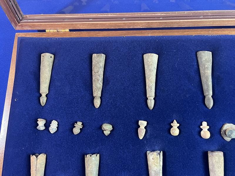 CONFEDERATE COLLECTION OF DUG BAYONET SCABBARD TIPS AND LEAD CARTRIDGE BOX FINIALS