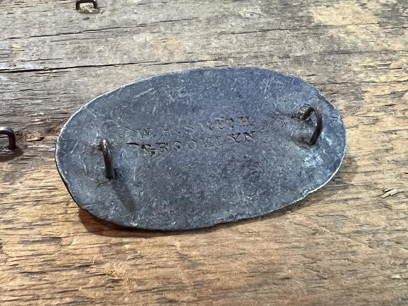 SCARCE SMALL SIZE OVAL US CARTRIDGE BOX PLATE STAMPED “W.H. SMITH / BROOKLYN