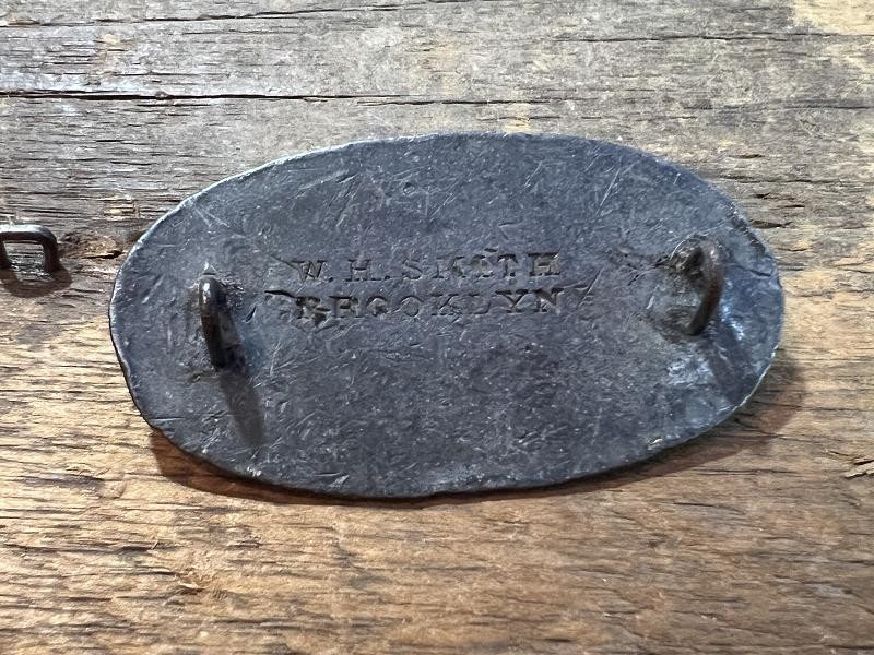 SCARCE SMALL SIZE OVAL US CARTRIDGE BOX PLATE STAMPED “W.H. SMITH / BROOKLYN